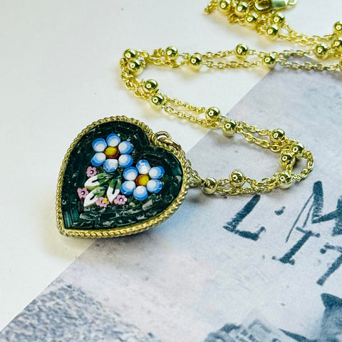 Leoni & Vonk micro mosaic heart pendant on a gold chain with a vintage postcard