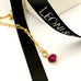 Leoni & Vonk july birthstone ruby heart necklace photogprahed near Leoni & Vonk ribbon