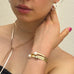 Cropped image of a girl wearing Leoni  & Vonk leather and pearl jewellery