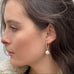 Model wearing Leoni & Vonk Camille keshi pearl earrings
