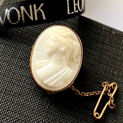 Leoni & Vonk antique 9ct gold white cameo brooch on a black background
