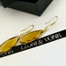 Leoni & Vonk citrine teardrop gold earrings on a white background with Leoni & Vonk ribbon and box