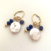 Leoni & Vonk interchangeable pearl, lapis and sapphire earrings on a white background