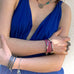 Cropped image of a woman wearing Leoni & Vonk bracelets