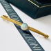 Leoni and Vonk vintage 9ct gold opal brooch on a white background with Leoni & Vonk ribbon