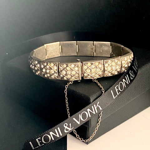 Leoni & Vonk sterling silver and paste bracelet on a black box and with Leoni & Vonk ribbon