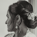 Dark haried bride smiling and looking our of the frame. She is wearing Leoni & Vonk crystal and baroque pearl earrings