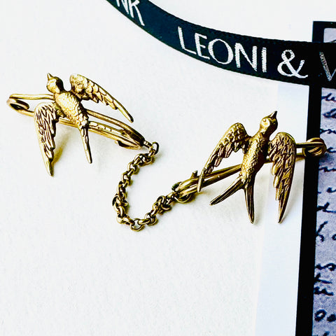 Leoni & Vonk Edwardian 14ct gold double swallow brooch with Leoni & Vonk ribbon