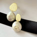 Leoni & Vonk Yi su gold and keshi pearl stud earrings on black ribbon
