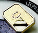 Leoni & Vonk antique horseshoe brooch on a white background with Leoni & Vonk ribbon