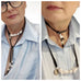Woman wearing a blue shirt and Leoni & Vonk leather and pearl necklace