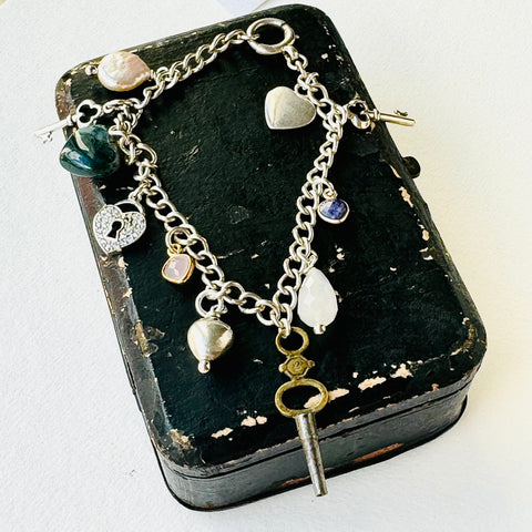 Leoni & Vonk heart and key sterling silver charm bracelet on a vintage box