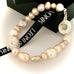 Leoni & Vonk pearl bracelet with Leoni & Vonk ribbon and gift box