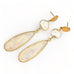 Leoni & Vonk pearl, gold and moonstone earrings on a white background 