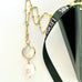 Leoni & Vonk pearl drop necklace with Leoni & Vonk ribbon
