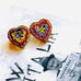 leoni & Vonk vintage micro mosaic double heart brooch on a vintage postcard.