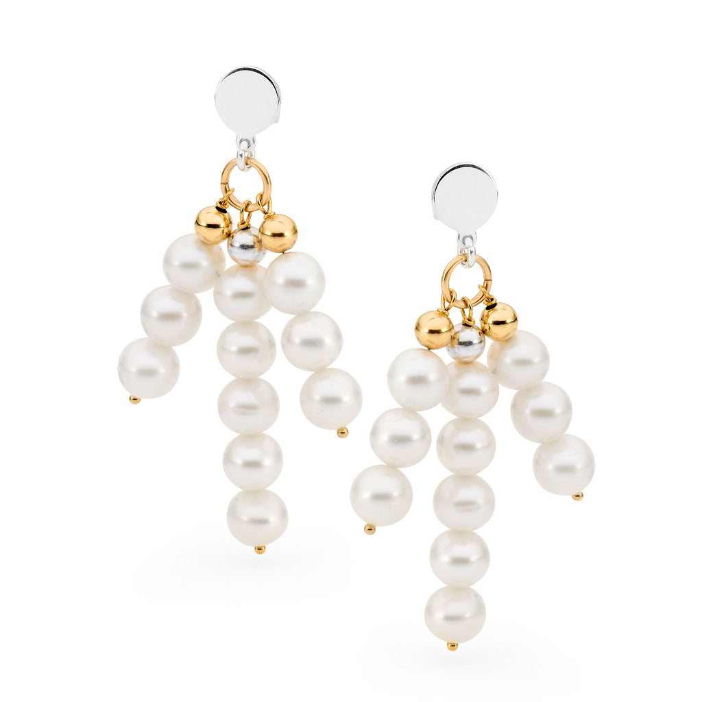 Leoni & Vonk white pearl statement earrings photographed against a white background 