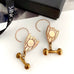 Leoni & Vonk 9ct gold plate antique shield cufflink earrings with a Leoni & Vonk box and ribbon.