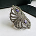 Leoni & Vonk art deco sterling silver, amethyst and marcasite ring on a white background
