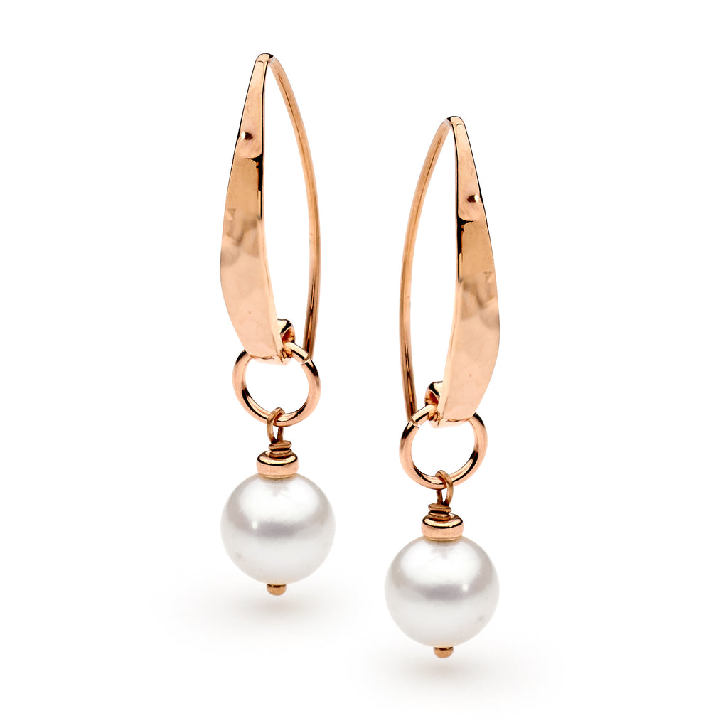 Image of Leoni & Vonk rose gold and pearl earrings photographed against a white background.