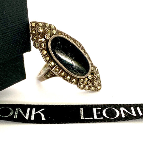 Leoni & Vonk vintage sterling silver marcasite and black onyx ring on a white background and with Leoni & Vonk ribbon
