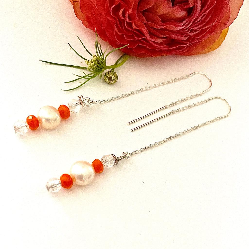 Leoni & Vonk Greeves St white pearl and orange crystal earrings with an orange flower