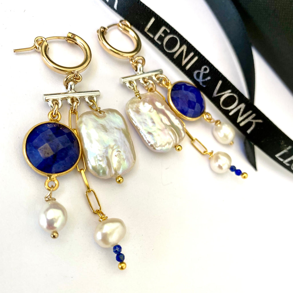 Leoni & Vonk pearl, sapphire, gold and silver chandelier  earrings on a white background and with Leoni & Vonk ribbon.