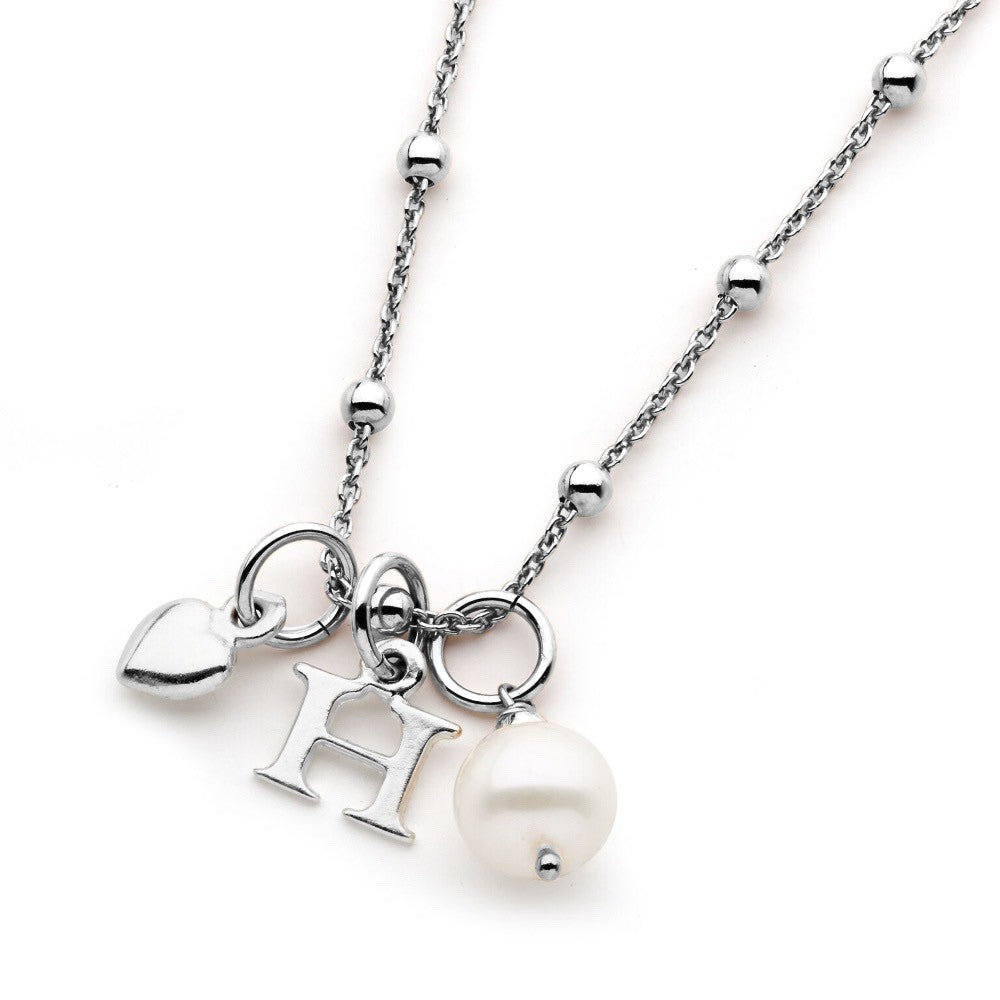 Leoni & Vonk sterling silver personalised initial, heart and pearl necklace on a white background
