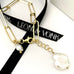 Leoni & Vonk gold bracelet with keshi pearls and Leoni & Vonk ribbon