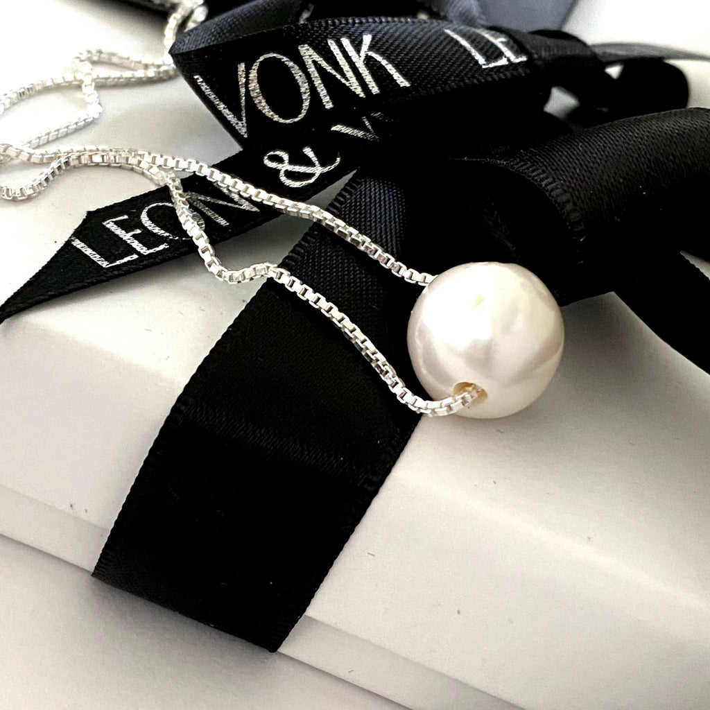 Leoni & Vonk sterling silver and large pearl neckalce with a white box and Leoni & Vonk ribbon