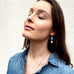 Model wearing Leoni & Vonk turquoise jewellery and denim jacket