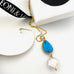 Leoni & Vonk turquoise and Kesha pearl necklace with Leoni & Vonk ribbon