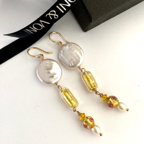 Leoni & Vonk white keshi pearl, vintage Venetian beads and freshwater pearl drop earrings on a white background and with Leoni & Vonk ribbon.