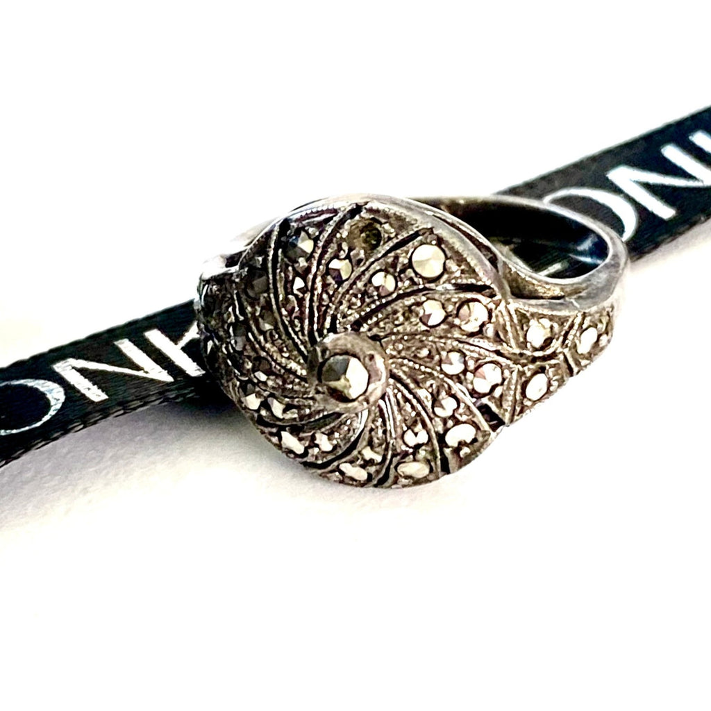 Leoni & vonk sterling silver vintage marcasite rinfg on a white background and with Leoni & Vonk ribbon
