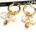 Leoni & Vonk gold hoop earrings with pearl and crystal drops on a white background and with Leoni & Vonk ribbon
